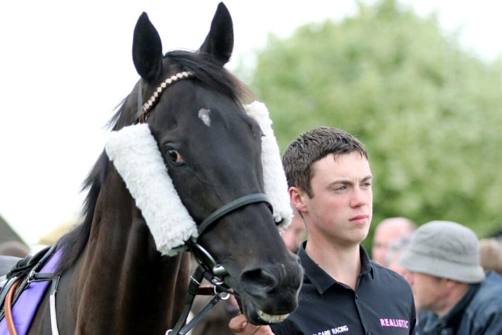 Ryan and Cosmic Chatter in the parade ring at Beverley
